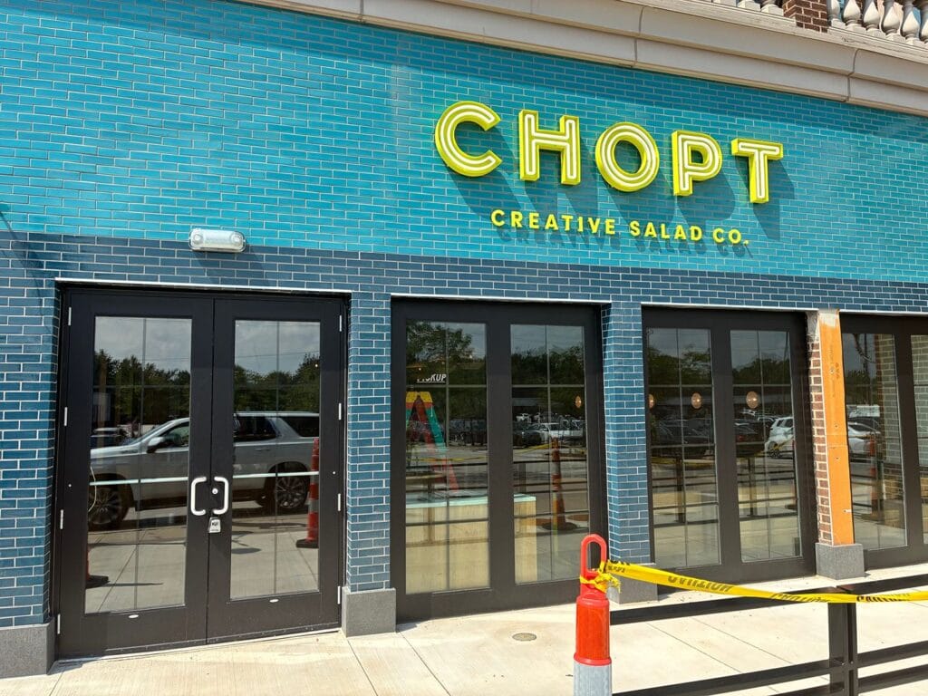 CHOPT Creative Salad Co. storefront with teal tiling during fit-out